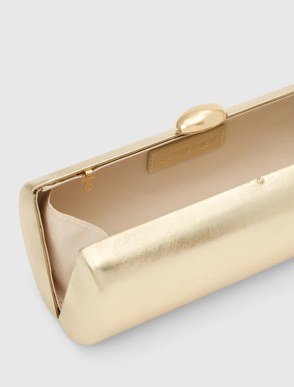 Adeline East West Hardcase Clutch Gold_mannequin