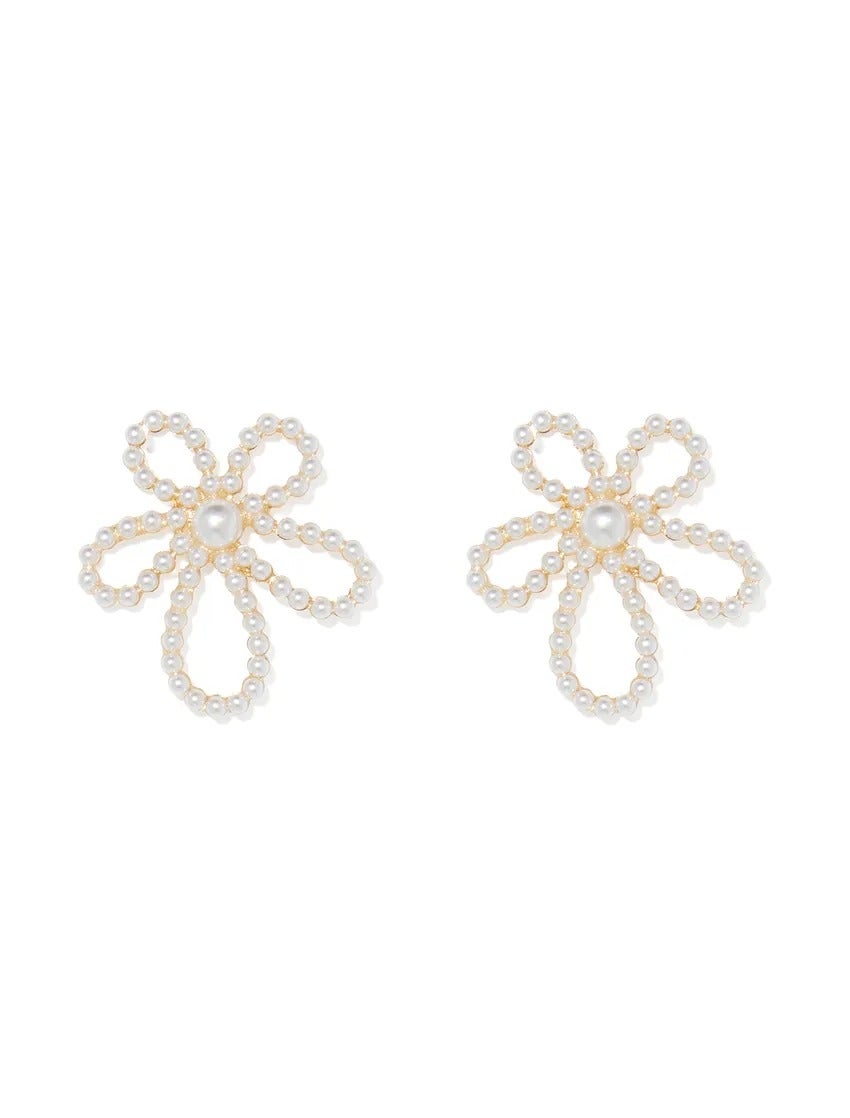 statement pearl earrings in the shape of flowers